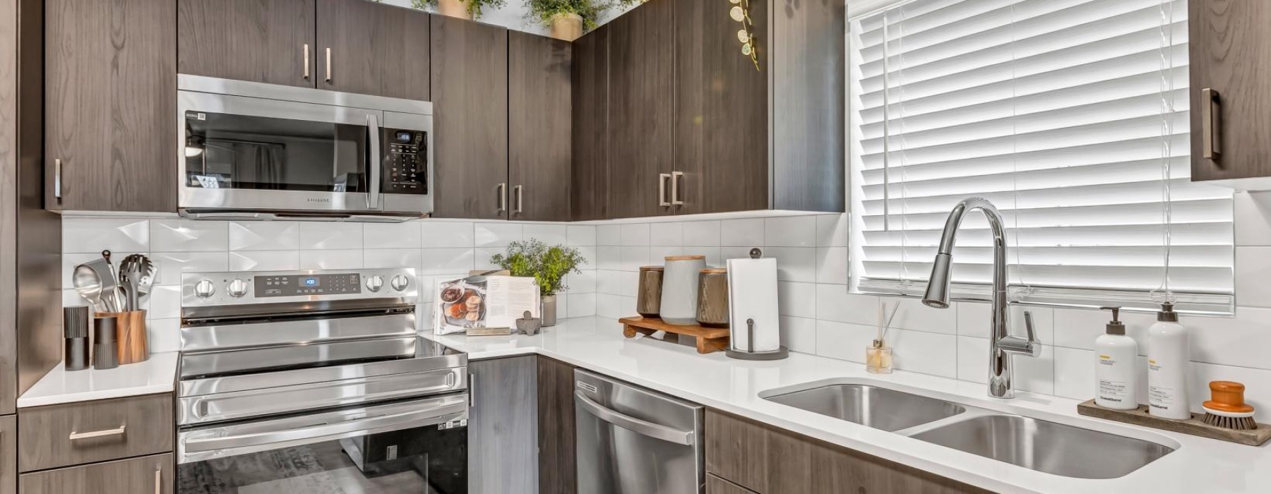 a kitchen with wooden cabinets